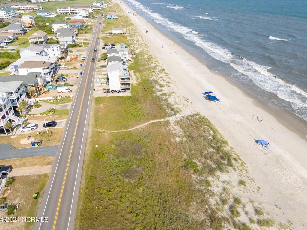Photo of 52155217 E Beach Drive, Oak Island, NC 28465 (MLS # 100449469)
