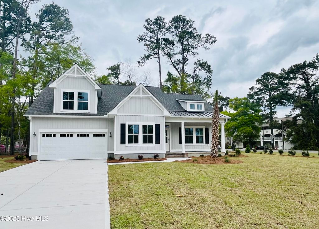 Photo of 9002 Ocean Harbour Golf Club Road SW, Calabash, NC 28467 (MLS # 100523500)