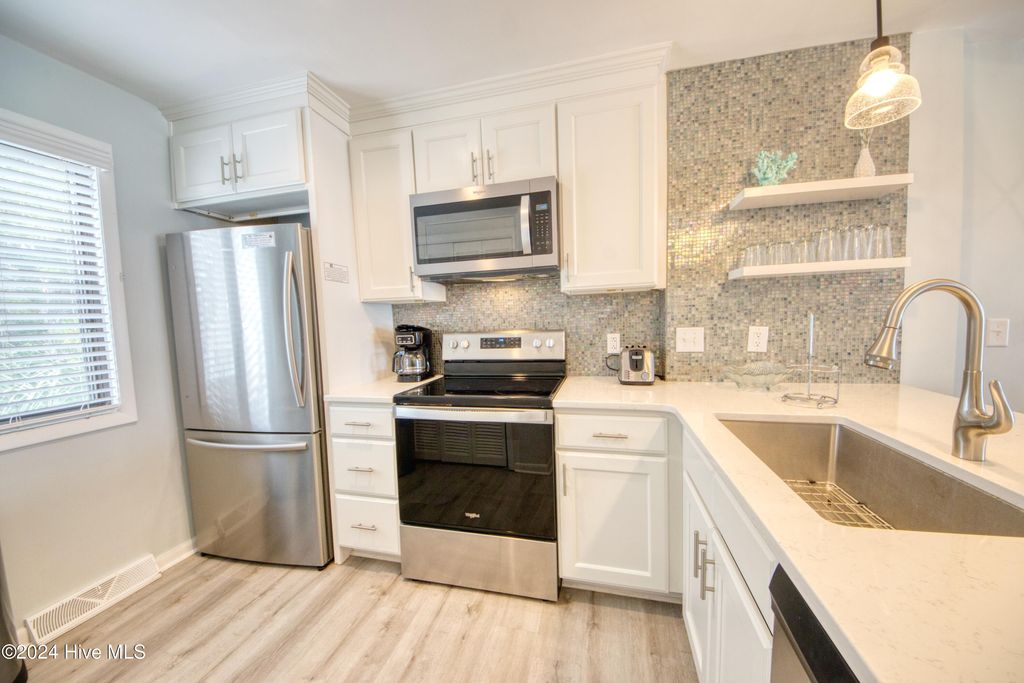 Photo of 2001 Surfrider Court, Kure Beach, NC 28449 (MLS # 100530034)