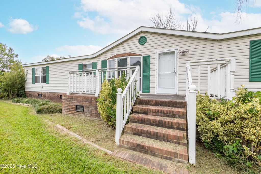 Photo of 328 Middle Swamp Road, Corapeake, NC 27926 (MLS # 100536801)