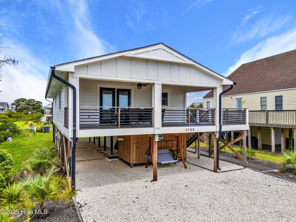 Photo of 2508 E Beach Drive, Oak Island, NC 28465 (MLS # 100524184)