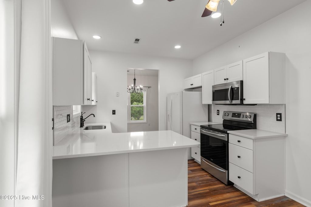 Photo of 5009 N Hampton Drive SE, Southport, NC 28461 (MLS # 100536420)