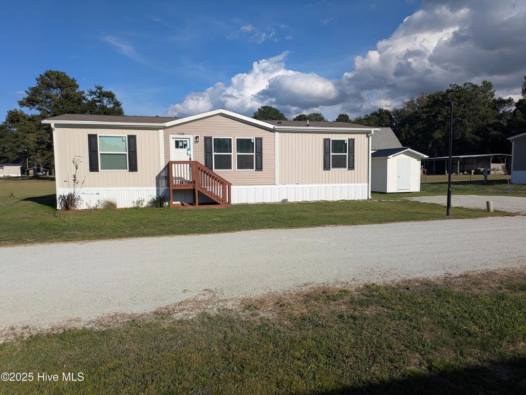 Photo of 1118 Old Tar Landing Road, Jacksonville, NC 28540 (MLS # 100526166)