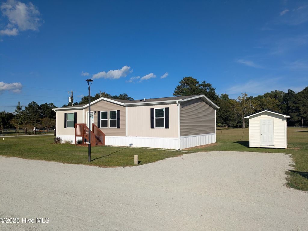 Photo of 1118 Old Tar Landing Road, Jacksonville, NC 28540 (MLS # 100526166)