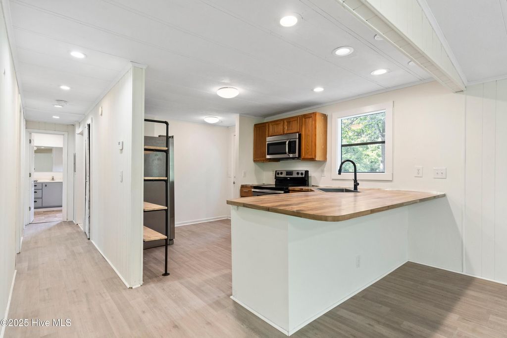 Photo of 666 Bay Harbor Drive, Hampstead, NC 28443 (MLS # 100514481)