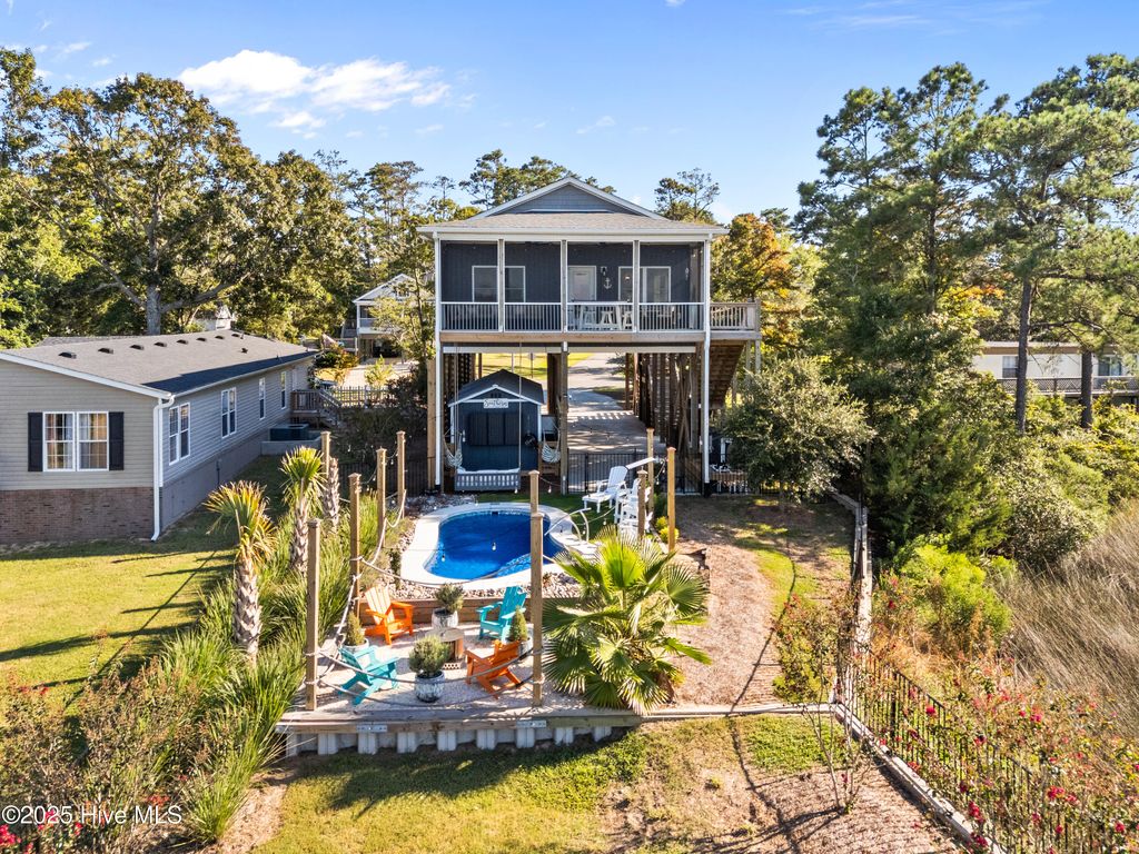 Photo of 7202 E Yacht Drive, Oak Island, NC 28465 (MLS # 100530778)
