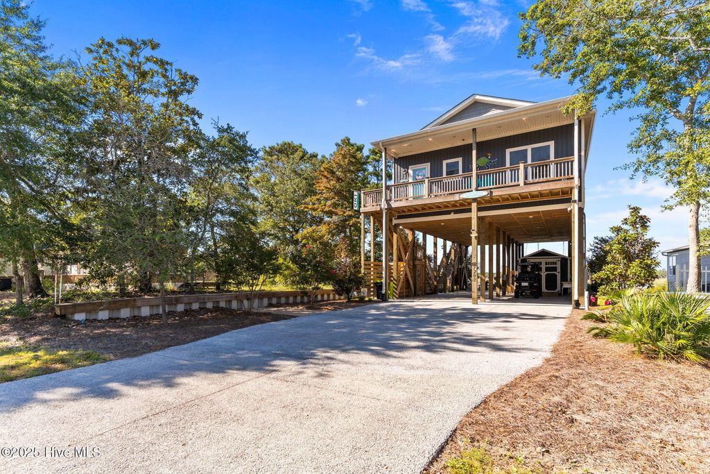Photo of 7202 E Yacht Drive, Oak Island, NC 28465 (MLS # 100530778)