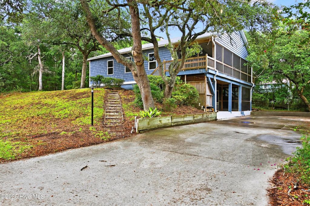 Photo of 108 SE 37th Street, Oak Island, NC 28465 (MLS # 100523948)