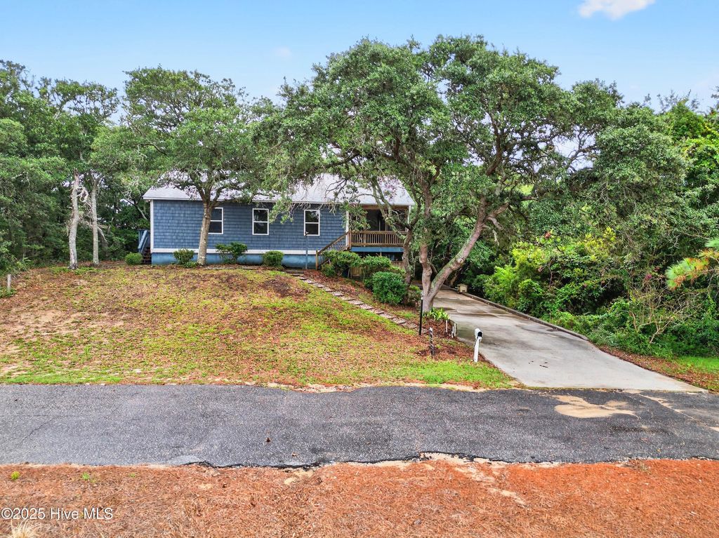 Photo of 108 SE 37th Street, Oak Island, NC 28465 (MLS # 100523948)