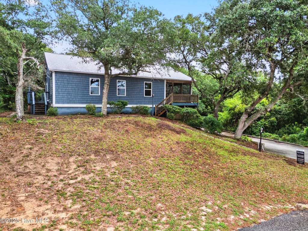 Photo of 108 SE 37th Street, Oak Island, NC 28465 (MLS # 100523948)