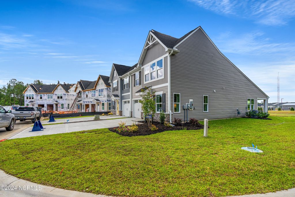 Photo of 631 Savinwood Trail NE, Bolivia, NC 28422 (MLS # 100534010)