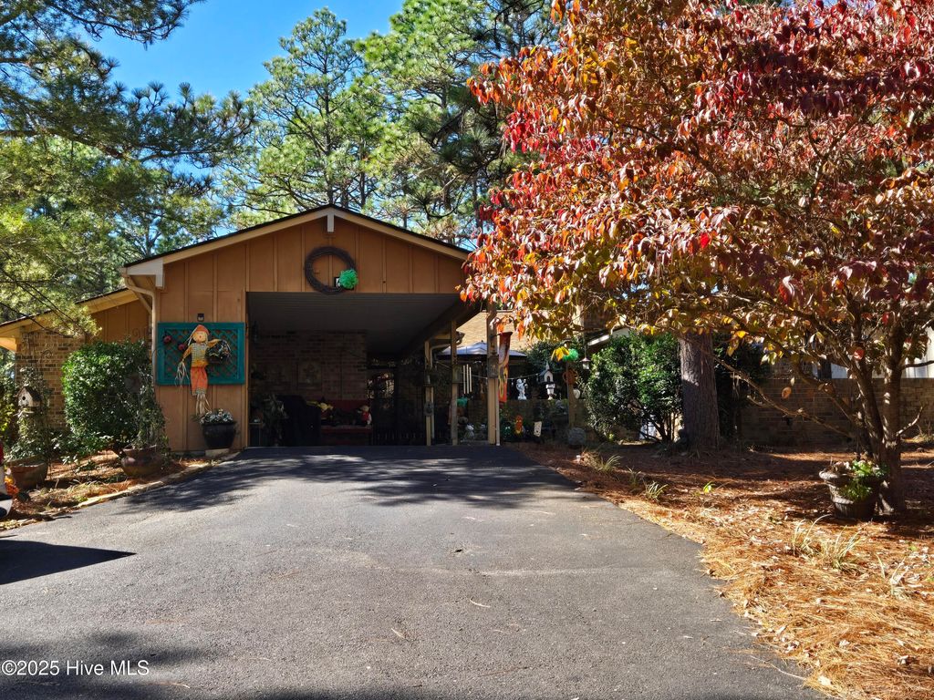 Photo of 642 Redwood Drive, Southern Pines, NC 28387 (MLS # 100537611)