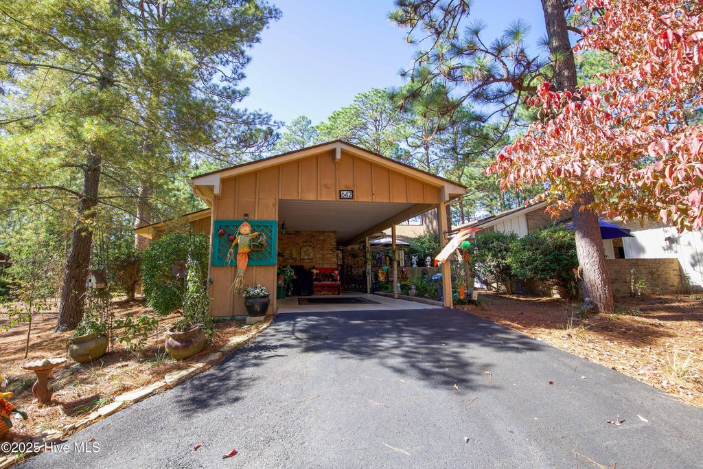 Photo of 642 Redwood Drive, Southern Pines, NC 28387 (MLS # 100537611)