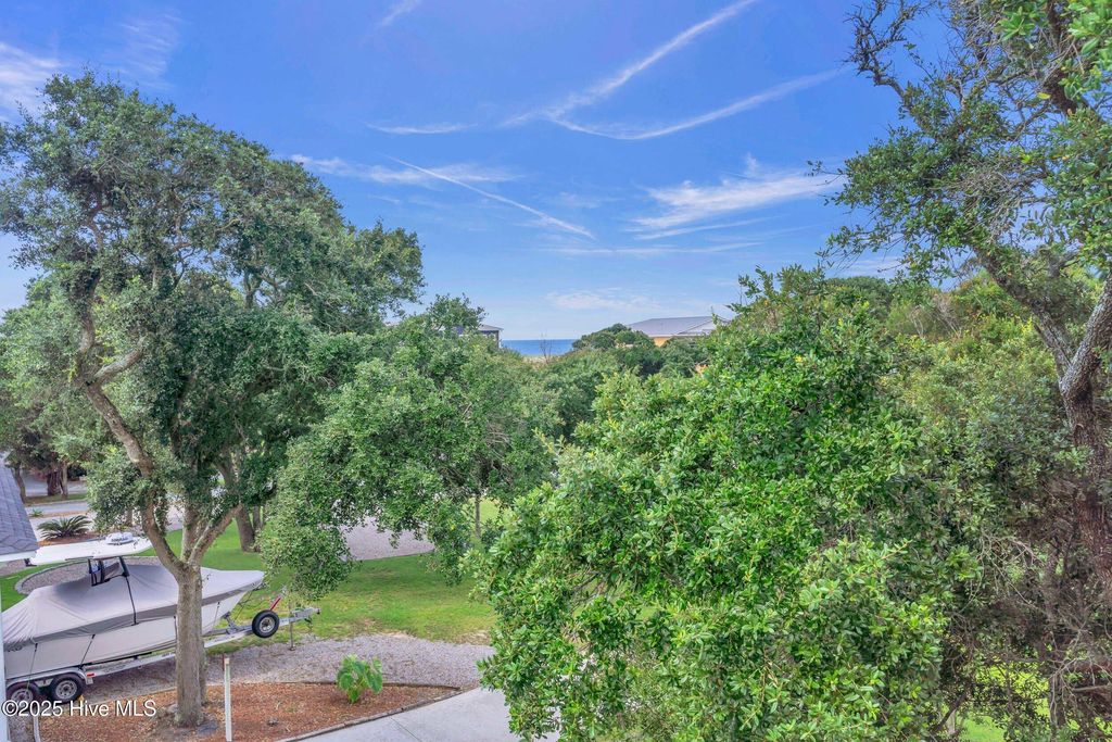 Photo of 114 SE 63rd Street, Oak Island, NC 28465 (MLS # 100522612)