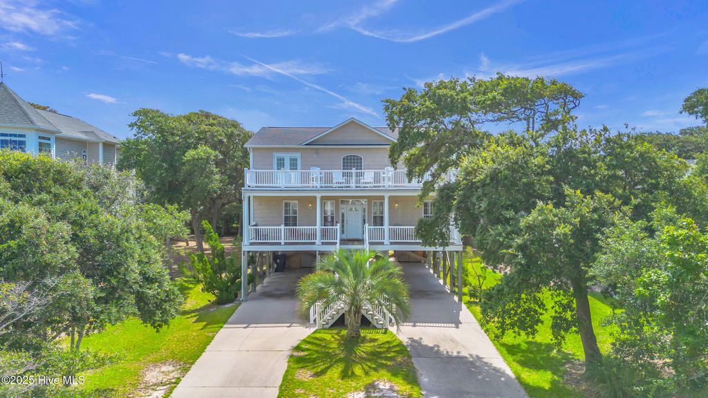 Photo of 114 SE 63rd Street, Oak Island, NC 28465 (MLS # 100522612)