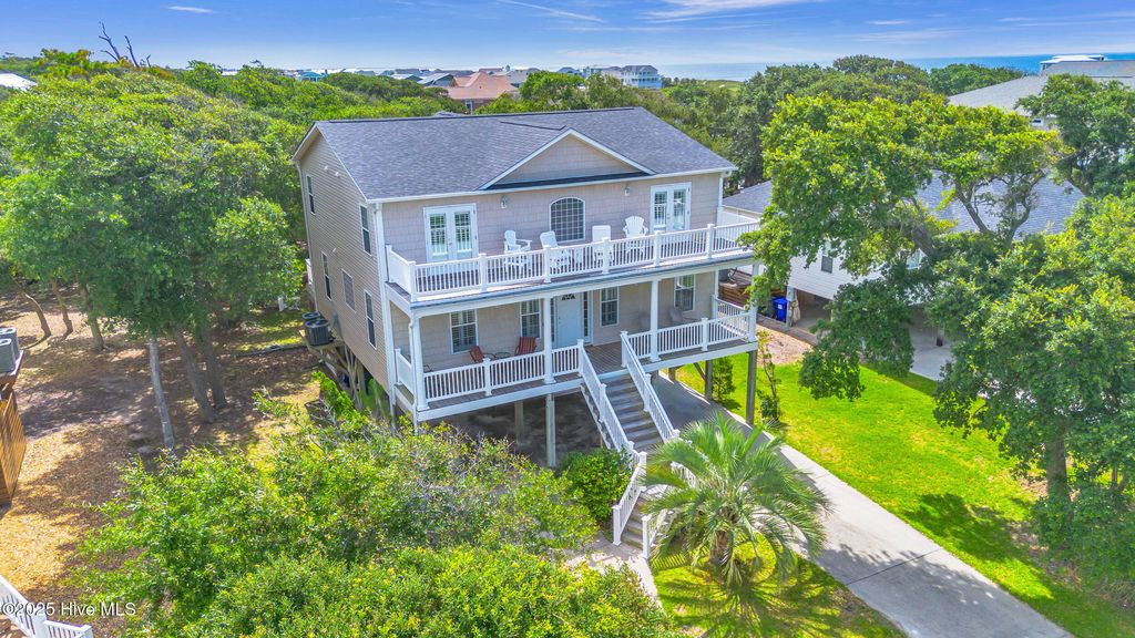 Photo of 114 SE 63rd Street, Oak Island, NC 28465 (MLS # 100522612)