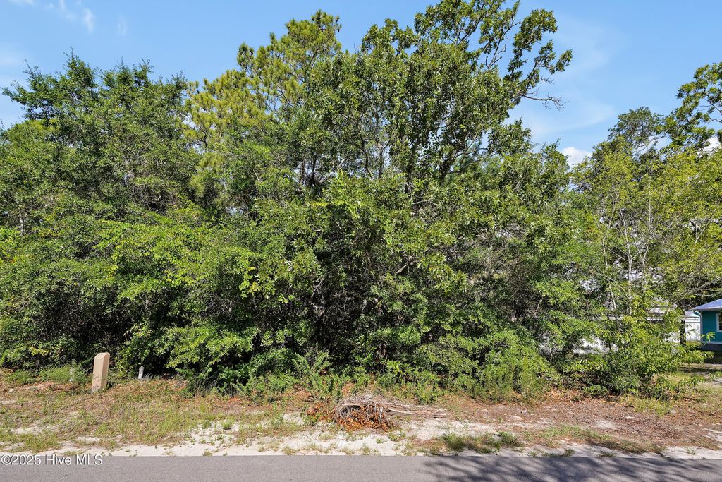 Photo of 21 NE 18th Street, Oak Island, NC 28465 (MLS # 100517128)