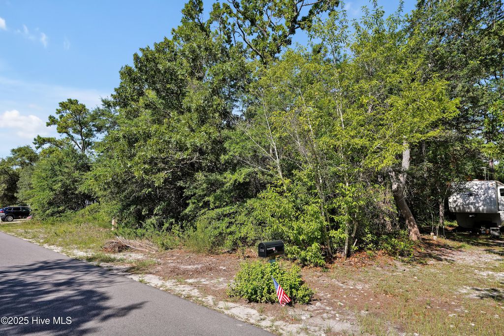 Photo of 21 NE 18th Street, Oak Island, NC 28465 (MLS # 100517128)