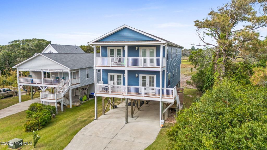 Photo of 2216 E Pelican Drive, Oak Island, NC 28465 (MLS # 100532717)