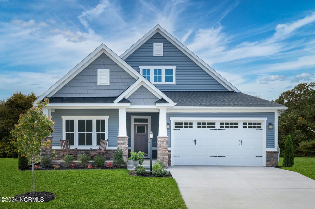 Photo of 4017 Farmfield Drive, Navassa, NC 28451 (MLS # 100525264)
