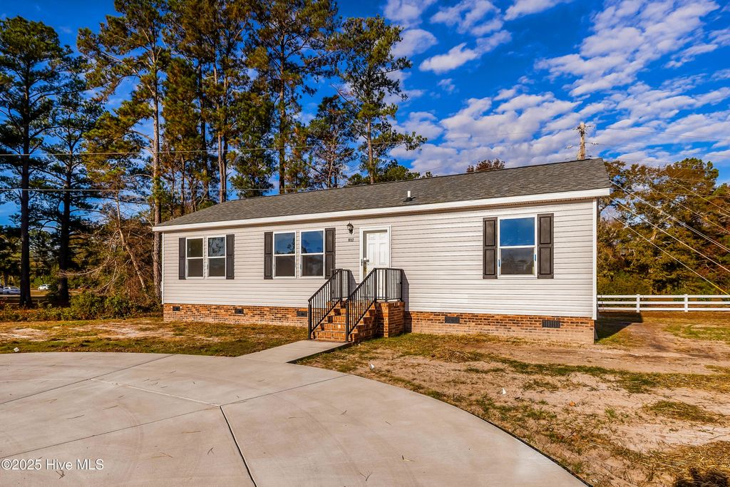 Photo of 852 Yaupon Drive SW, Calabash, NC 28467 (MLS # 100543416)