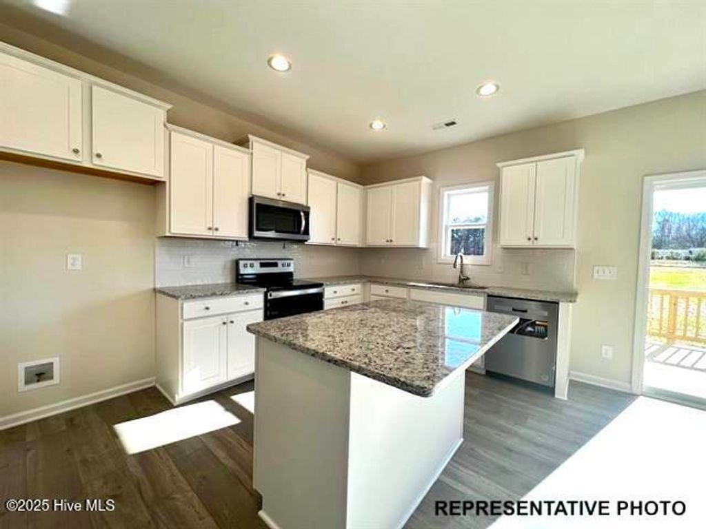 Photo of 551 Springtooth Drive, Zebulon, NC 27597 (MLS # 100537254)