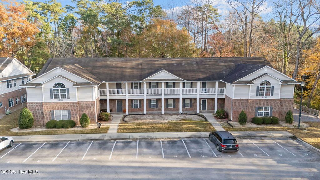 Photo of 2235 Locksley Woods Drive #E, Greenville, NC 27858 (MLS # 100543089)