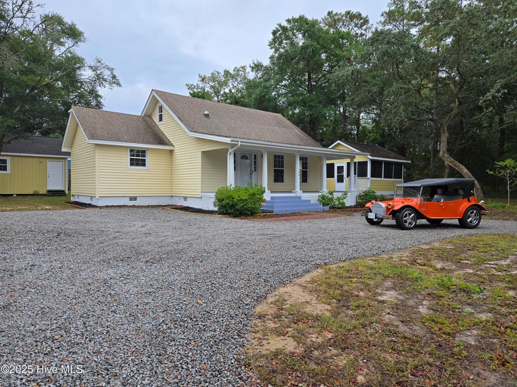 Photo of 108 NW 29th Street, Oak Island, NC 28465 (MLS # 100515608)
