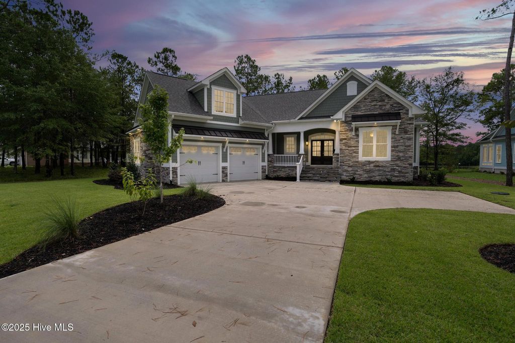 Photo of 557 Hearthside Drive SE, Bolivia, NC 28422 (MLS # 100522748)