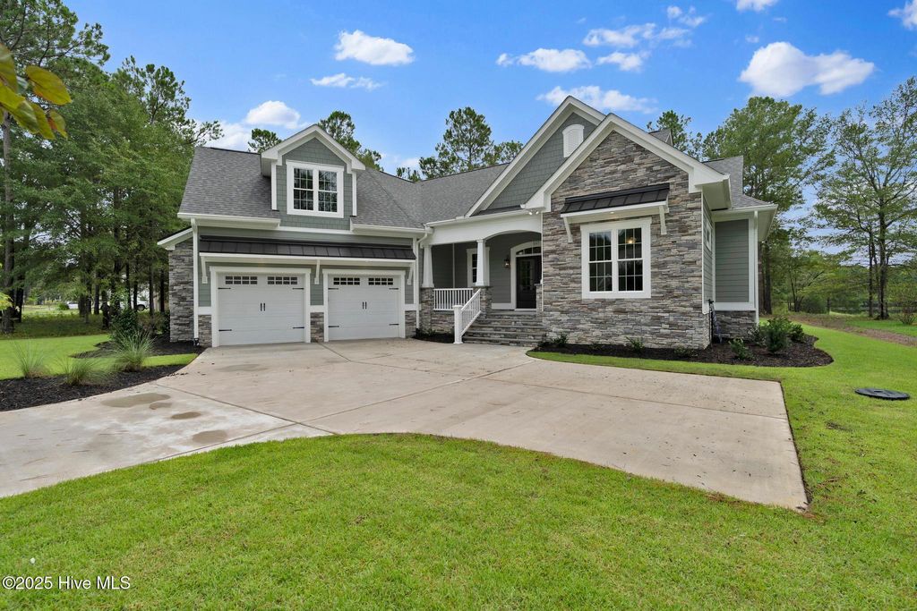 Photo of 557 Hearthside Drive SE, Bolivia, NC 28422 (MLS # 100522748)
