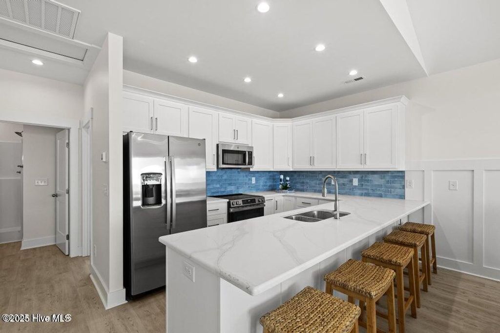 Photo of 753 N Topsail Drive, Surf City, NC 28445 (MLS # 100534978)