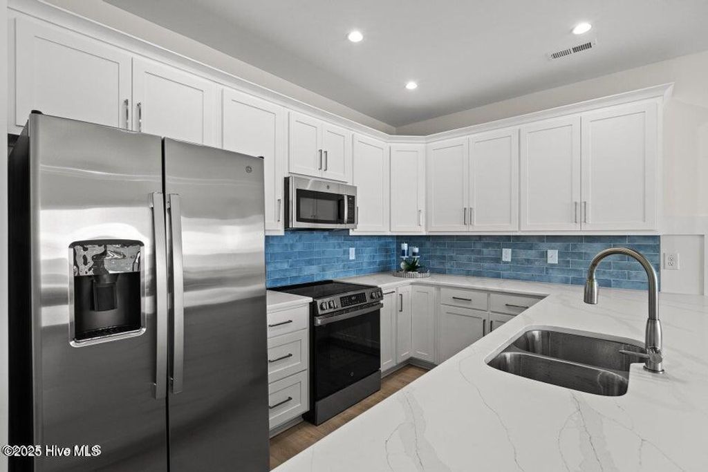 Photo of 753 N Topsail Drive, Surf City, NC 28445 (MLS # 100534978)