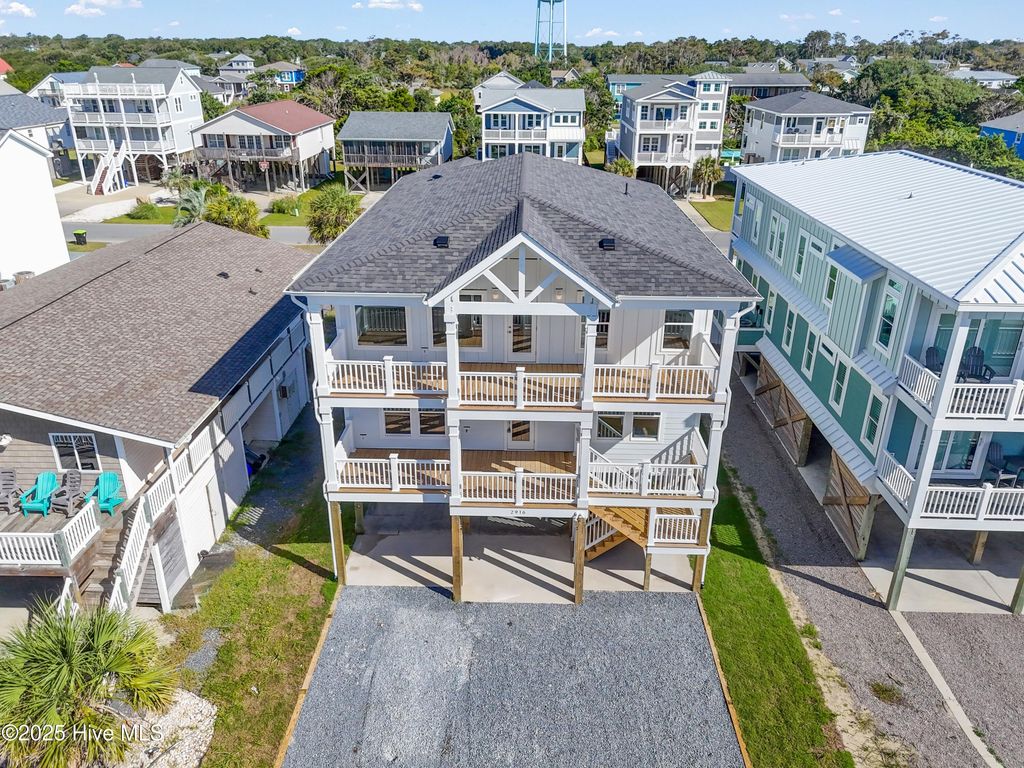 Photo of 2916 E Beach Drive, Oak Island, NC 28465 (MLS # 100511699)