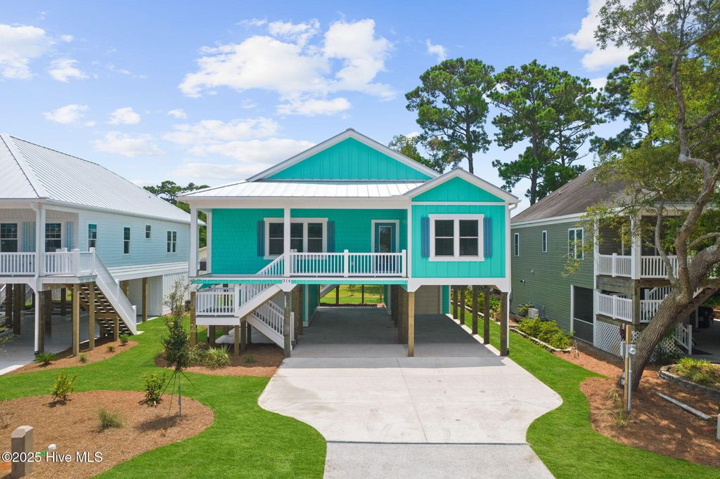 Photo of 228 NE 56th Street, Oak Island, NC 28465 (MLS # 100524435)