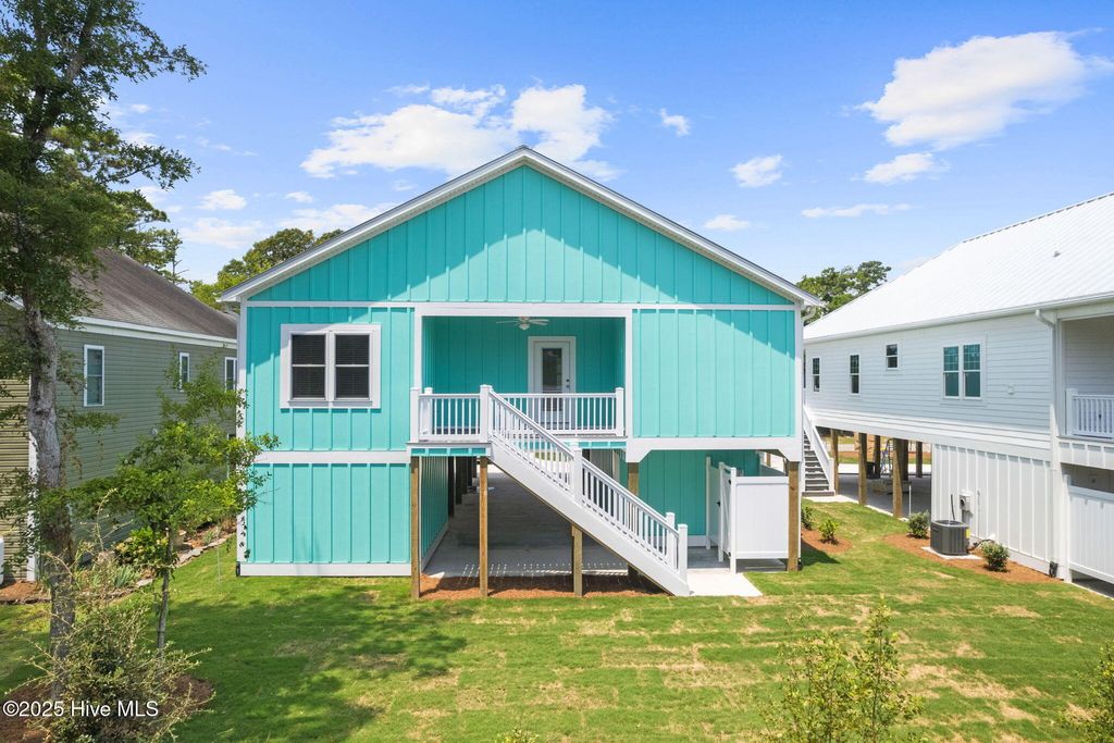 Photo of 228 NE 56th Street, Oak Island, NC 28465 (MLS # 100524435)