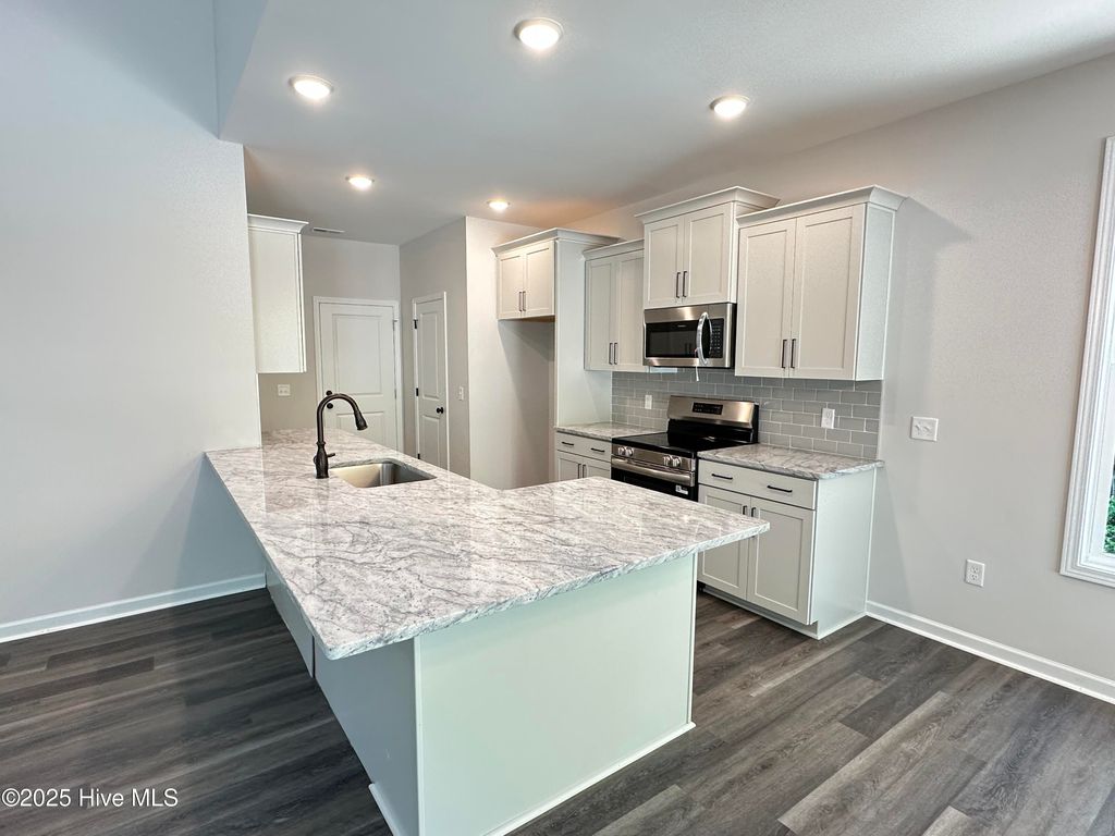 Photo of 3188 Oak Drive SW, Shallotte, NC 28470 (MLS # 100512844)