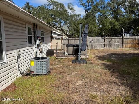 Tiny photo for 214 NE 54th Street, Oak Island, NC 28465 (MLS # 100538712)