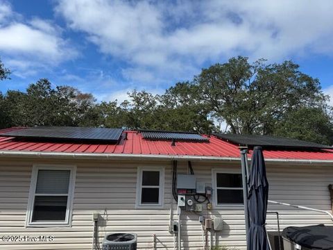 Tiny photo for 214 NE 54th Street, Oak Island, NC 28465 (MLS # 100538712)