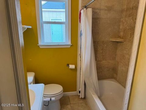 Tiny photo for 214 NE 54th Street, Oak Island, NC 28465 (MLS # 100538712)