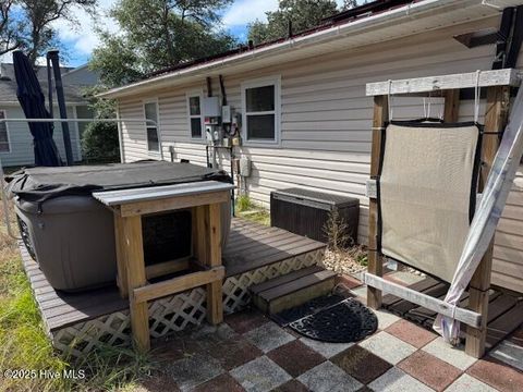 Tiny photo for 214 NE 54th Street, Oak Island, NC 28465 (MLS # 100538712)