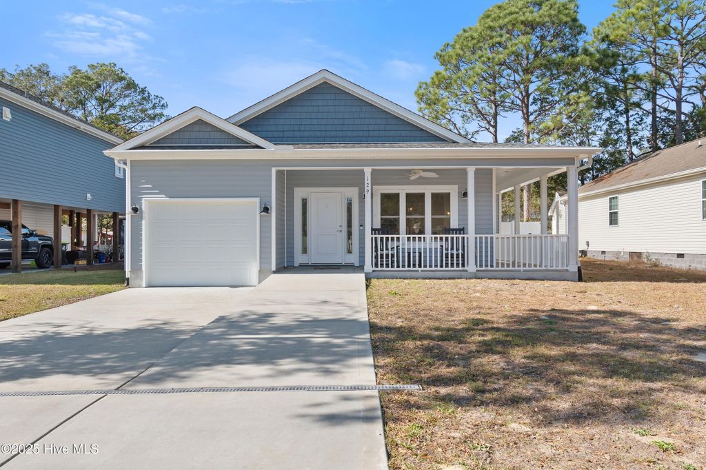 Photo of 129 NW 8th Street, Oak Island, NC 28465 (MLS # 100542658)