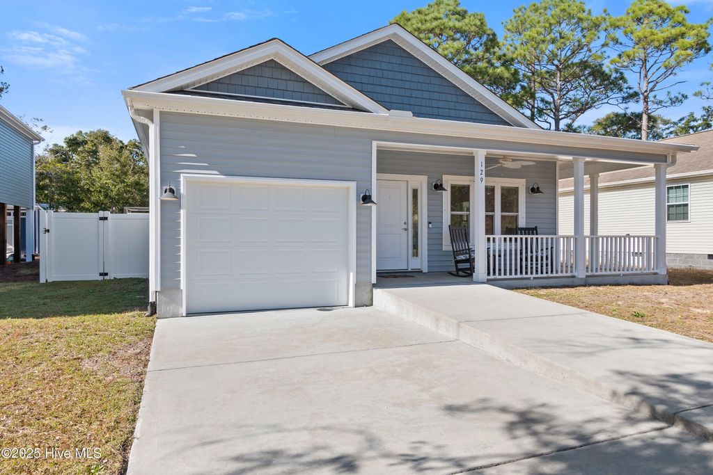 Photo of 129 NW 8th Street, Oak Island, NC 28465 (MLS # 100542658)