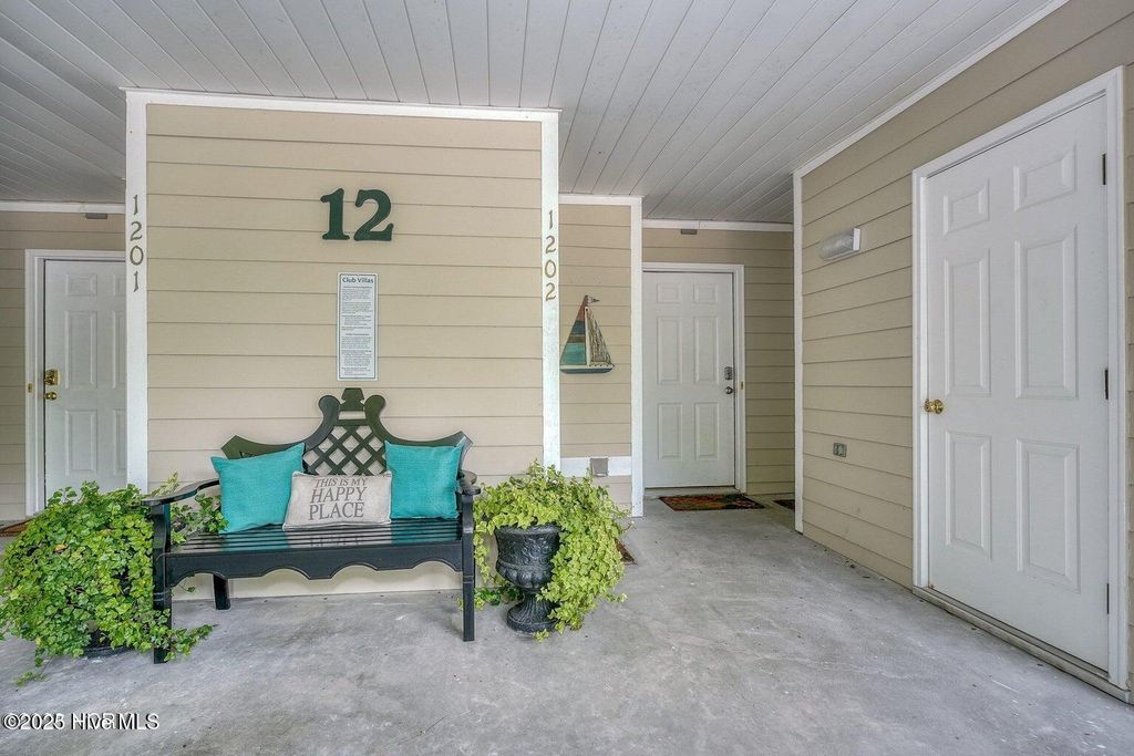 Photo of 3350 Club Villas Drive # 1202, Southport, NC 28461 (MLS # 100543125)