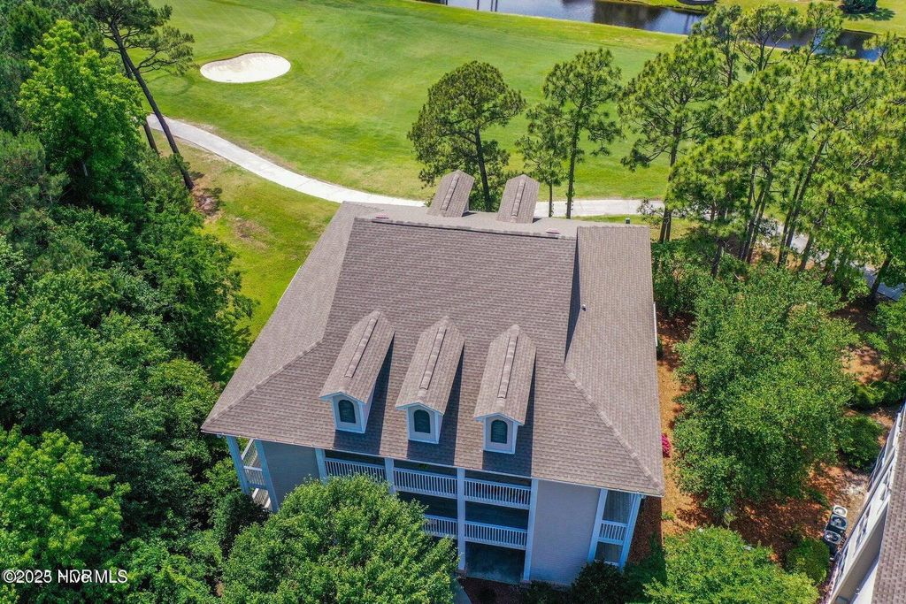 Photo of 3350 Club Villas Drive # 1202, Southport, NC 28461 (MLS # 100543125)