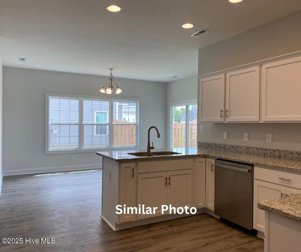 Photo of 635 Indigo Johnston Drive, Jacksonville, NC 28546 (MLS # 100509465)