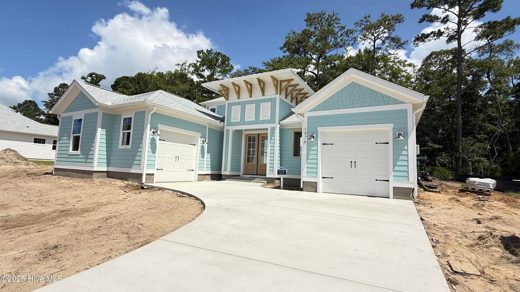 Photo of 1976 Indigo Cove Way, Calabash, NC 28467 (MLS # 100521268)