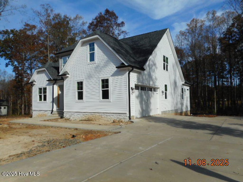 Photo of 12874 Mallard Rock Road, Zebulon, NC 27597 (MLS # 100543852)