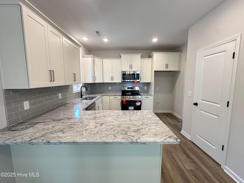 Photo of 218 Country Club Drive SW, Shallotte, NC 28470 (MLS # 100504419)