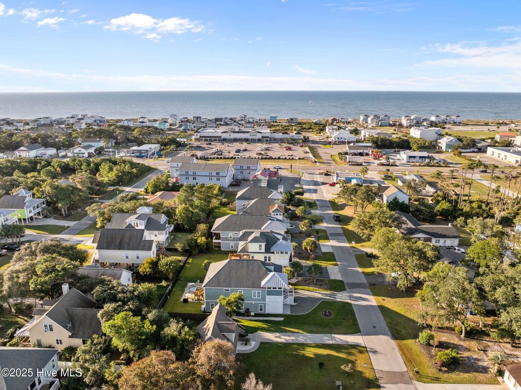 Photo of 114 NE 50th Street, Oak Island, NC 28465 (MLS # 100537146)