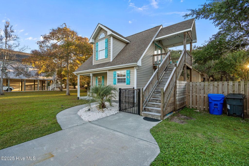 Photo of 114 NE 50th Street, Oak Island, NC 28465 (MLS # 100537146)